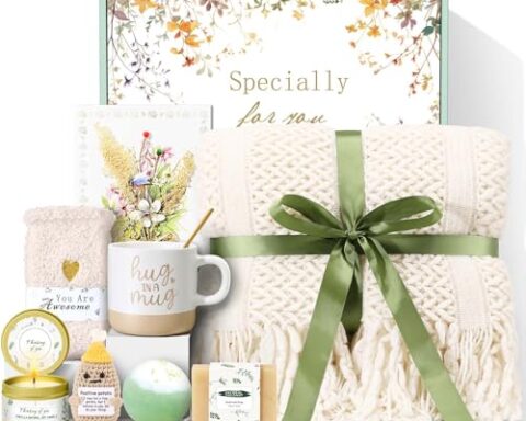 A thoughtful gift for her — self-care spa basket with ultra-soft knitted tassel blanket, ceramic mug, vanilla candle & bath treats
