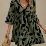 A go-anywhere pick for vacation: Plus-Size Plant-Print V‑Neck A-Line Dress with Flounce Sleeves